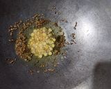 A picture of step 3 of Vangi Bath (Brinjal fried rice).