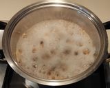 Foto del passaggio 3 della ricetta Risoni risottati con tofu zafferano e crema di fagioli piattoni
