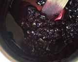 A picture of step 5 of Sponge cake filled with chunky blue berry jam.