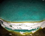 A picture of step 5 of Malai white choco crepe cake.