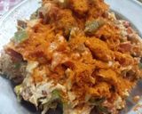 A picture of step 4 of Cheesy tikka pizza.
