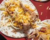 A picture of step 5 of Crockpot Mexican Pulled Chicken.