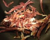 Une image de l'étape 6 de Pommes de terre rattes au jambon cru tête de moine ail et persil.