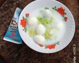 Foto langkah ke 5 dari resep Telur Puyuh dan Sawi Putih Kuah Santan.