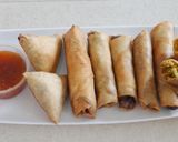 A picture of step 8 of Chicken springrolls.