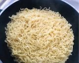A picture of step 1 of Not so boring Indomie bachelor go-to meals.