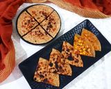 A picture of step 8 of Paneer Pizza Stuffed Paratha.