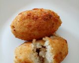 A picture of step 9 of Arancini - mozzarella and ragù stuffed rice balls.