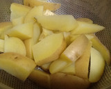 Foto del paso 5 de la receta: Gajos de patatas bravas