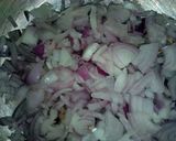 A picture of step 3 of Dafadukar shinkafa mai daddawa da dafaffen kwai da nama.