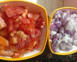 A picture of step 1 of Tomato onion in spicy gravy.