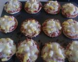 Foto del paso 5 de la receta: Mini pizzas de piña, jamón y queso