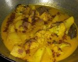 A picture of step 12 of Cauliflower potato curry.