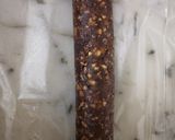 A picture of step 7 of Til and peanuts date roll.