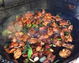 A picture of step 7 of Paella with Vegetables and Meat.