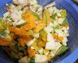 A picture of step 1 of Zucchini, Squash Blossom, Mushroom, and Corn Soup.
