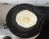 A picture of step 4 of Dosa with aloo masala.