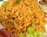 A picture of step 7 of OrangeGreen Jollof Rice.