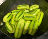 A picture of step 1 of Shahi parval (pointed gourd curry).
