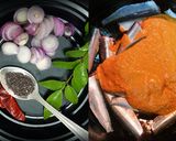 A picture of step 3 of Mathi Chatti Curry / Sardines cooked in earthen pot.
