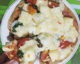 पनीर ओव्हरलोडेड चीझ पिझ्झा (paneer cheese pizza recipe in marathi) रेसिपी स्टेप 8 फोटो 