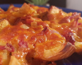 Foto del paso 8 de la receta: Patatas skin con bacon, queso y salsa