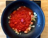 A picture of step 4 of Sausage pasta bake in tomato cream sauce.
