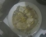 A picture of step 3 of Cream Dory with Bechamel sauce.
