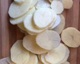 A picture of step 2 of Cheesy Potato Dauphinoise.