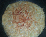 Foto del paso 7 de la receta: Tortilla de calabacín y cebolla