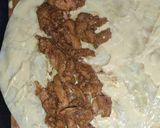A picture of step 14 of Chicken Frankie Roll.