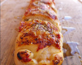Foto del paso 12 de la receta: Rulo de pizza de jamón, quesos y olivas