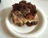 A picture of step 11 of Chocolate Cake with Sweetened Condensed Milk Cream and Strawberries.