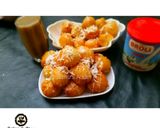 A picture of step 4 of Coconut puff puff.