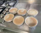 A picture of step 6 of Mini Coffee Vanilla Flans.
