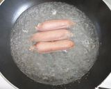 A picture of step 1 of Sausage Bread Rolls (with a bonus scrambled egg).