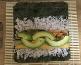 A picture of step 7 of Kimchi Avocado Sushi.
