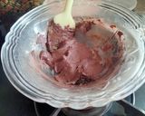 A picture of step 1 of Pomegranate and coconut flakes Dark chocolate bark.