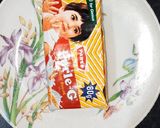 A picture of step 1 of Parle-g custard pudding.