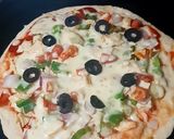 A picture of step 8 of Chicken tikka pizza.