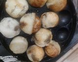 A picture of step 4 of Bread Roll in Appam Pan.