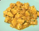 A picture of step 4 of Curry Chicken with Coconut Milk and Cashews.
