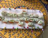 A picture of step 11 of Cucumber, Imitation Crab, and Feta Cream Appetizer Rolls.