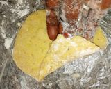 A picture of step 6 of Plantain stuffed cones.