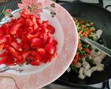 A picture of step 12 of Schezwan Fried Rice.