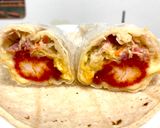 A picture of step 7 of Spicy Chicken Tortilla Wraps.
