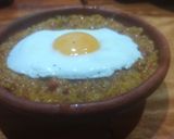 Foto del paso 5 de la receta: Cocina en crisis: Guiso de arroz amarillo coronado con 1 huevo