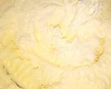 A picture of step 2 of 100 pieces vanilla cup cakes.