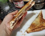 A picture of step 3 of Nutella and banana sandwich.