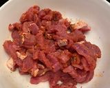 A picture of step 1 of Spicy Pork Lo Mein.